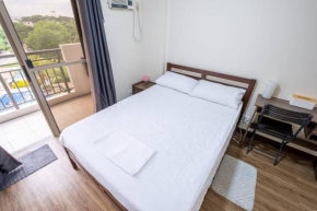 2BR Fully Air-Conditioned Staycation PLUS Free Parking